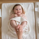 Changer un bebe : change sécurisé sans rougeurs, table à langer et accessoires